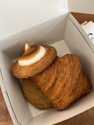 My smores round croissant, plain croissant, chocolate chip cookie, and brown butter oat cookie (underneath)