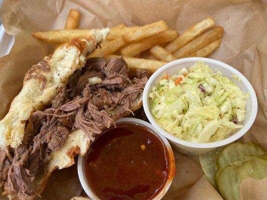 Smoked Brisket sandwich with regular fries.