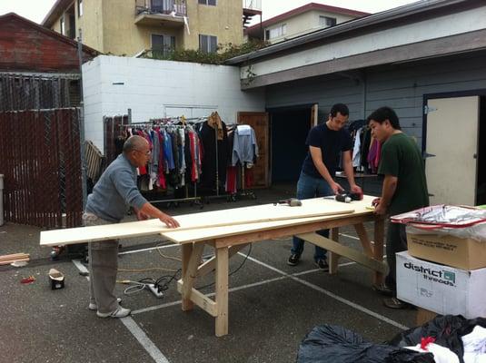 building wooden shelvings for a non-profit to store donated clothing