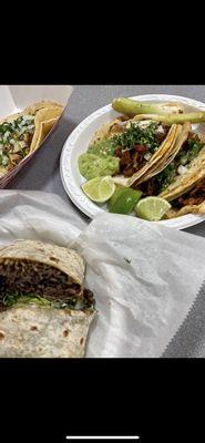 Carne asada burrito and Al pastor tacos