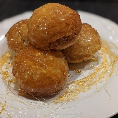 Croquembouche  Chocolate filled and vanilla cream filled puffs