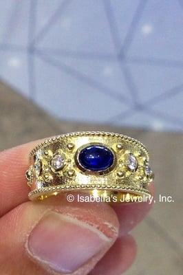 Custom Designed Sapphire and Diamond Ring. Design by George!