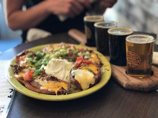 Tasting flight and Mexican stuffed potato skins