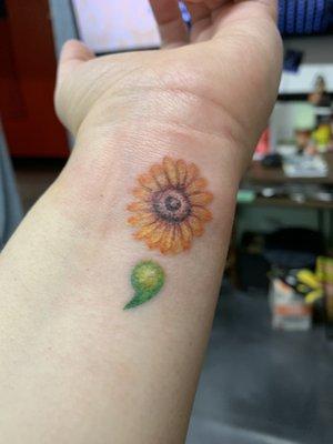 My sunflower semicolon tattoo.