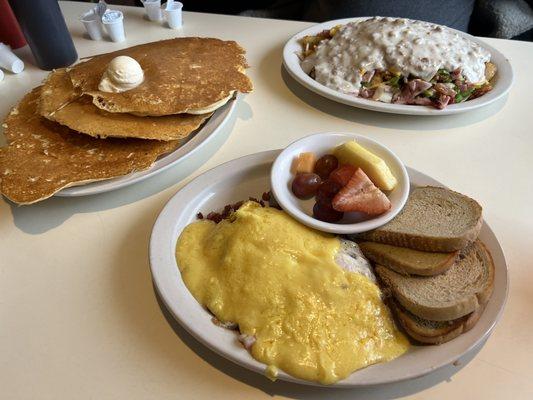 "G" plate (top), Holly and Hash breakfast (bottom), full stack of pancakes