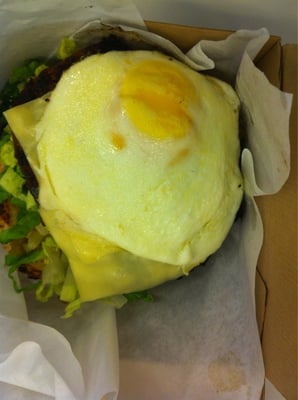 Took the burger to go.  Missing the top of the bun! Egg looks like play doh!!