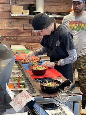 Making the bowls and sushi rolls