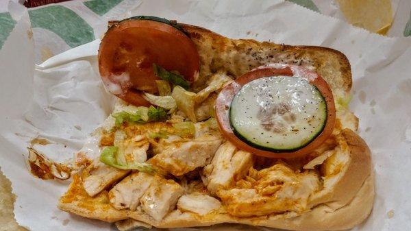 6 in grilled chicken breast. cucumber ranch dressing lettuce tomato toasted with light buffalo sauce not too spicy.