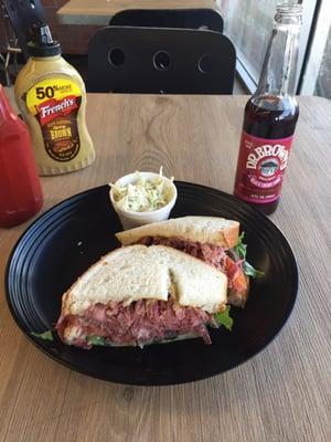 Great corn beef on Rye with a side of slaw and Dr. Brown black cherry soda.