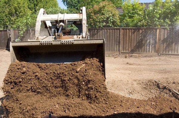 Backfill and grading of a swimming pool that has been removed