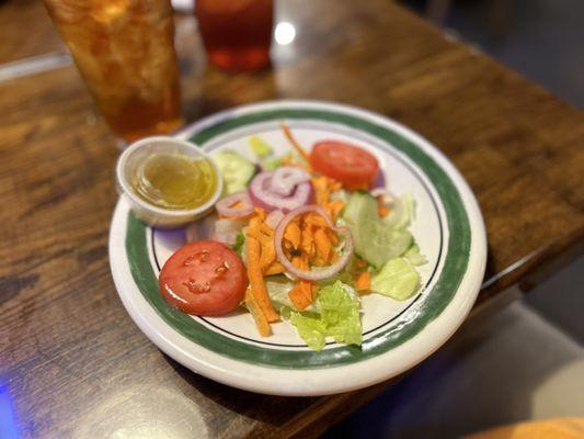 Complimentary salad with entree order- house dressing- average salad