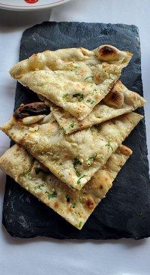 Two orders of Garlic Naan. Toasted, nice and soft, with really good flavor. Gotta get some naan to eat the saucey dishes.