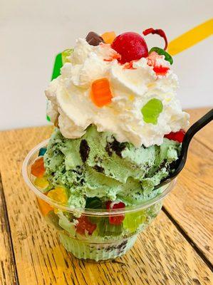 Homemade Mint Chocolate Chip Gummy-bear sundae with homemade whipped cream and a pretty cherry on top