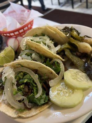 Lengua and tripa tacos (tongue and tripe)