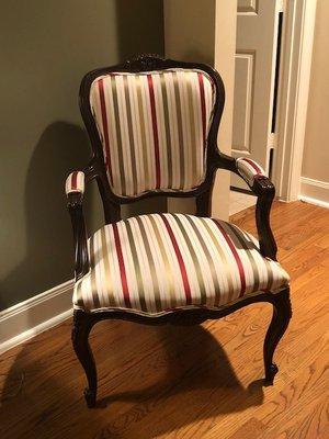 Re-upholstered arm chair