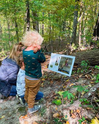 Reading with Grandma on the storybook hike