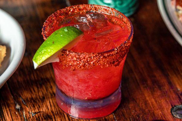 House Specialty Frozen Strawberry Margarita made with fresh ingredients daily.