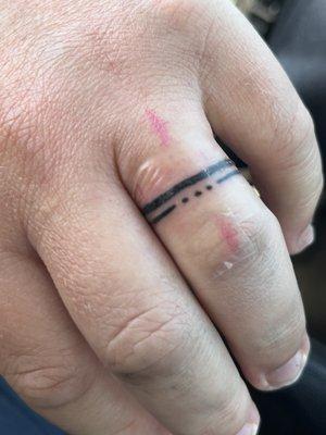 Wedding ring tattoo