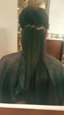 Due to the protective styles, treatment, and care, my hair has grown from my shoulder to my bra strap due to Portia.