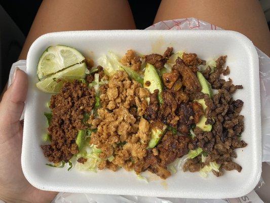 Beef, chicken, pork, and steak lettuce tacos