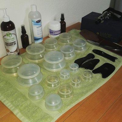 Manual therapy tools include cupping, gua sha, graston and percussion