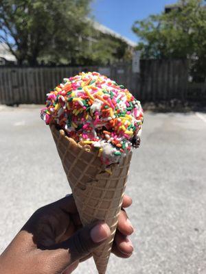 Cookies n cream topped with rainbow sprinkles.