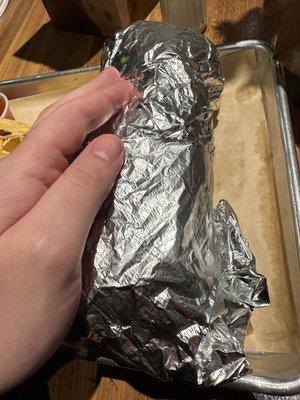 This burrito is longer than my hand!