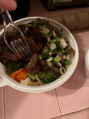 This is supposed to be a steak bowl with white rice only. Not a speck of rice in sight and way too much cabbage.