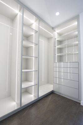 Custom Cabinets for Master Bedroom with Led Lighting and push to open drawers.