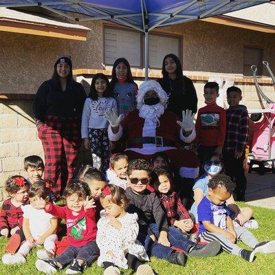 Merry Christmas with Santa and some of our kids that are all grown up came to join us