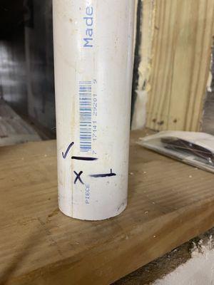 The top mark is where the depth of the pipe should have been the bottom Mark is where it was allowing it to leak into the home. 28801