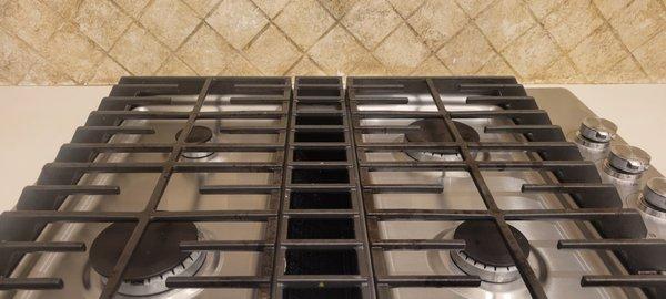 Deep cleaning, sanitation and disinfection of Stove.