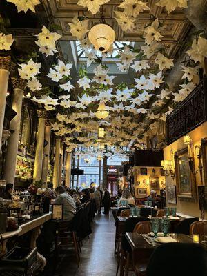 Beautiful restaurant with flowers on the ceiling all part of that