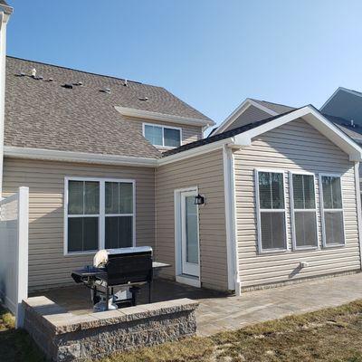 Paver patio with a nice accent sitting wall!