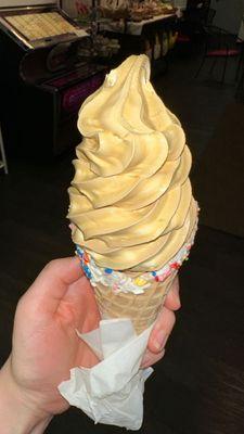 Top to bottom: Salted Caramel and Peanut Butter Soft Serve in waffle cone coated w/white choc and sprinkles