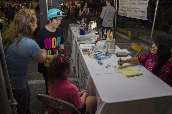 SarahSpiritual shocks this family with a spot on reading at Winterfest 2016 in wellington FL