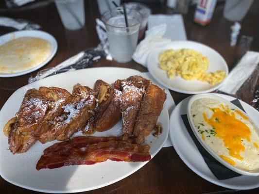 Banana foster french toast, eggs and cheese grits. All very good! The grits were some of the best I've ever had!