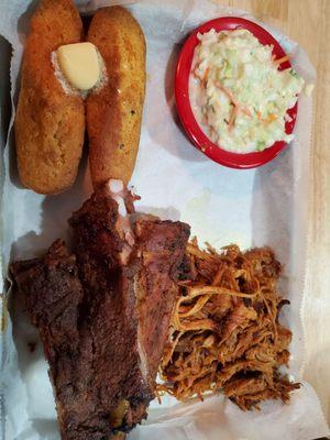 Pork and ribs with cornbread and slaw