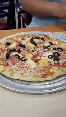 Special order.  Black olives,  ham and pineapples.