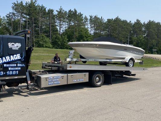 Loading boat trailer to repair