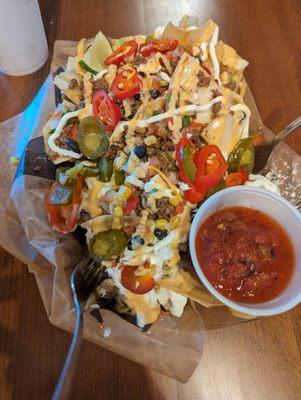 Nachos with ground waygu beef, roasted salsa on the side