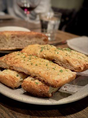 Garlic & Parmesan Focaccia $8