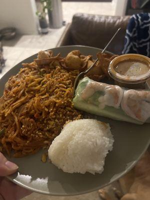 Take away Pad Thai with chicken, fresh roll, sticky rice, and crab rangoons. Delicious!!