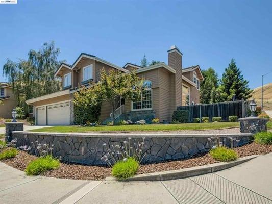 A custom home near trails in Dublin Hills with great views  .