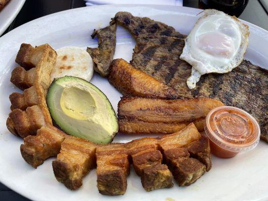 Bandeja paisa it's a must have when you come , you can substitute rice for salad which I always do . Service was great