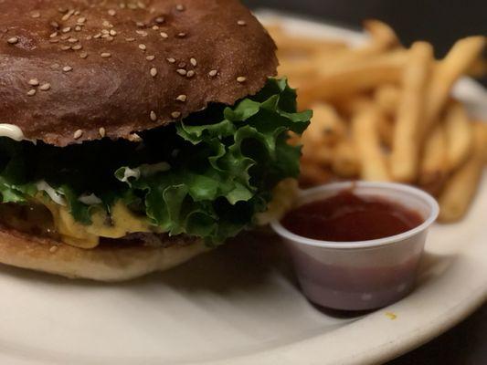 Burger and seasoned fries