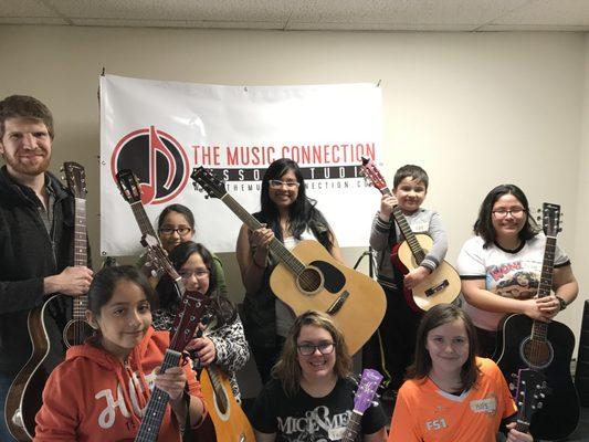 Group guitar class, taught by guitar instructor Ted.