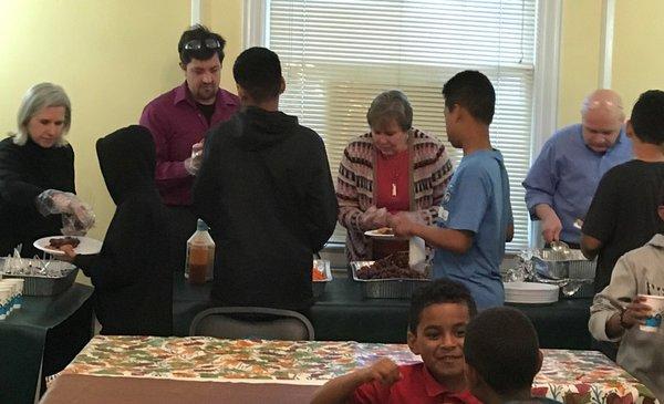 Everyone enjoys sharing a meal together, and we appreciate our volunteers who provide the food.