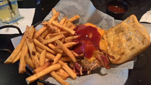 The Big Pig sandwich and fries.  I like mine with the dry rub seasoning on the sandwich with just a little bit of the tavern classic sauce.