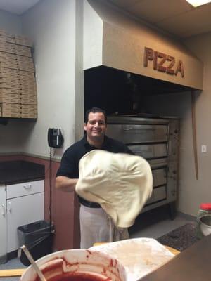 Anthony (owner) doing what he does best... Making pizza! What a genius man! A true talent!